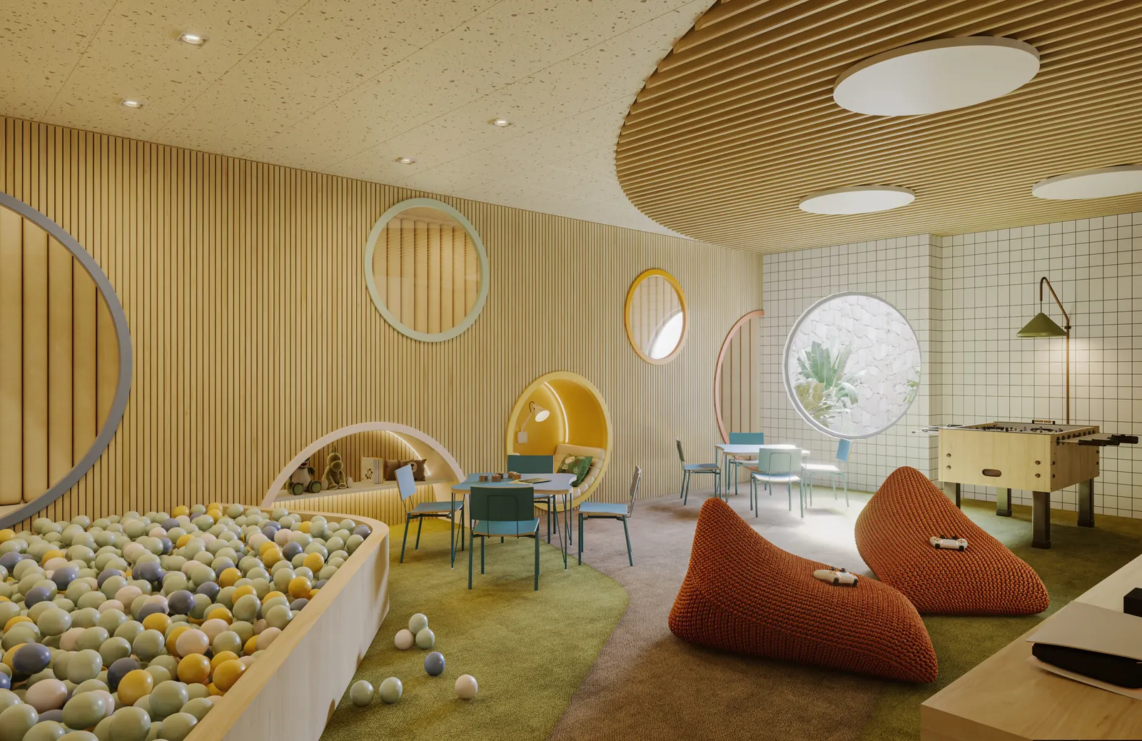 Espaço kids com piscina de bolinhas, janelas redondas e pufes