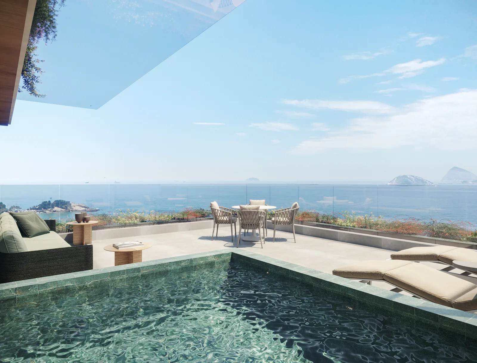 Terraço com piscina no alto do Ipanema Almar, com o mar e as ilhas ao fundo