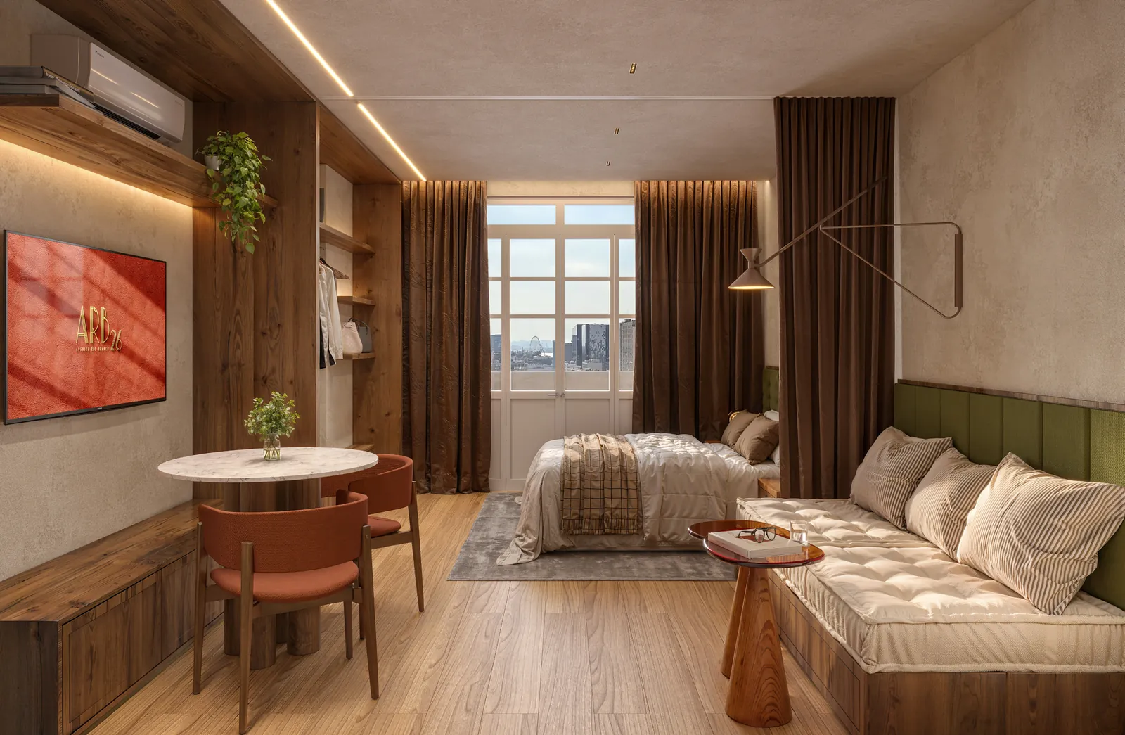 Studio com sofá, mesa de jantar e a cama perto da janela