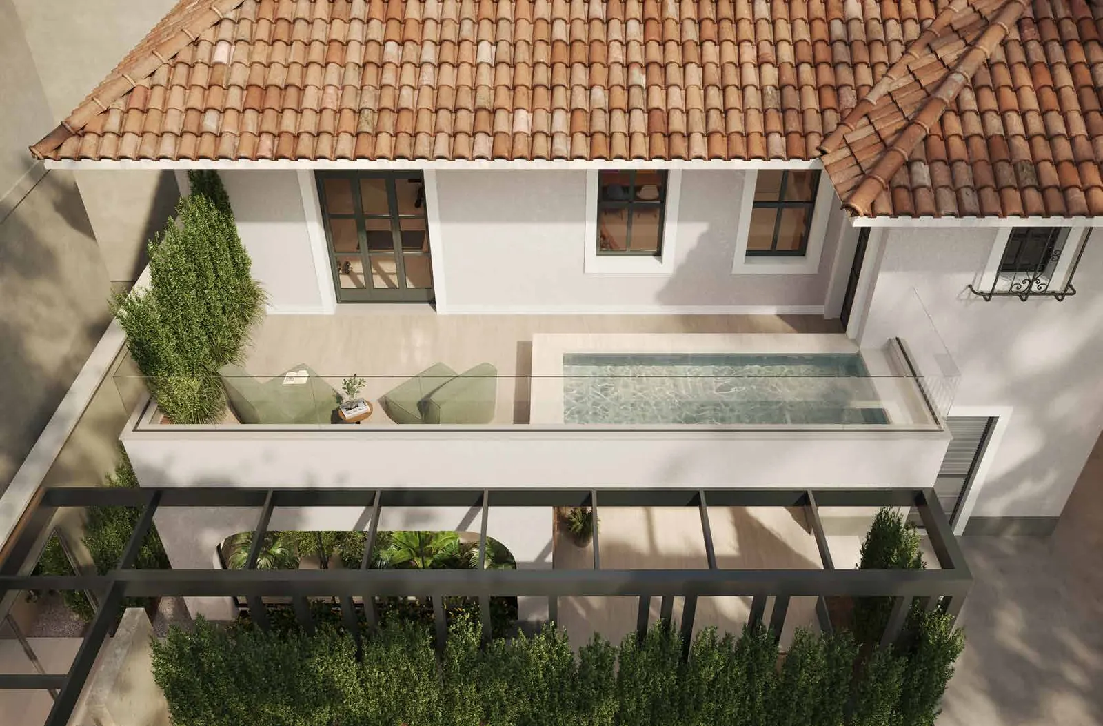 O terraço com hidromassagem sobre a casa preservada do Arc Ipanema, com telhado colonial