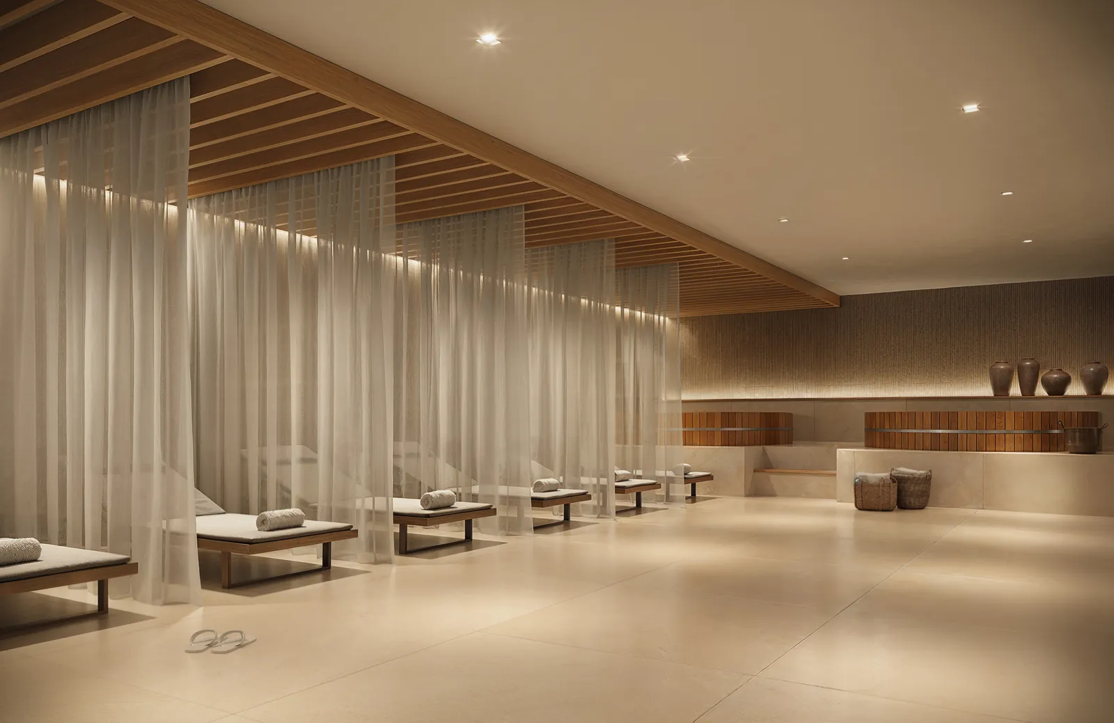 Spa com cortinas, macas e luz suave
