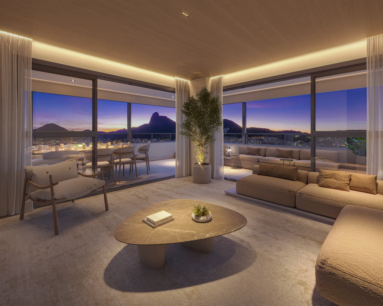 O living de um apartamento de 4 suítes do Arq, com sofás, varanda envidraçada e o Cristo ao fundo