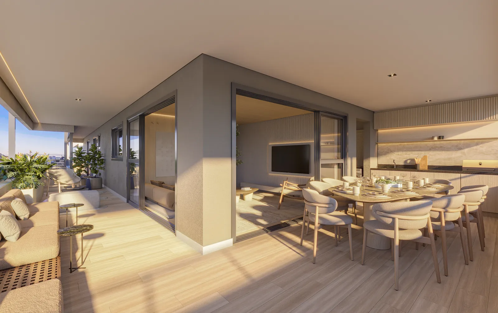 O terraço de um apartamento de 4 suítes, com mesa de jantar e vista para Botafogo
