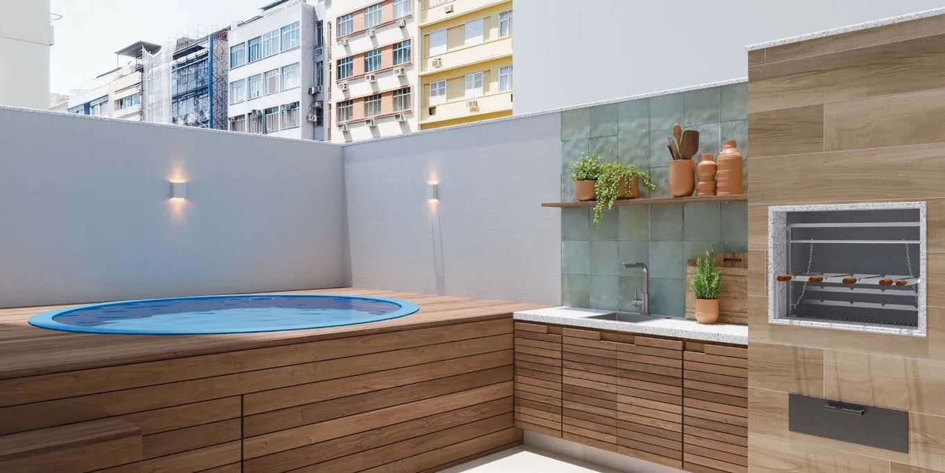 O terraço do garden 102 com piscina redonda, deck e churrasqueira