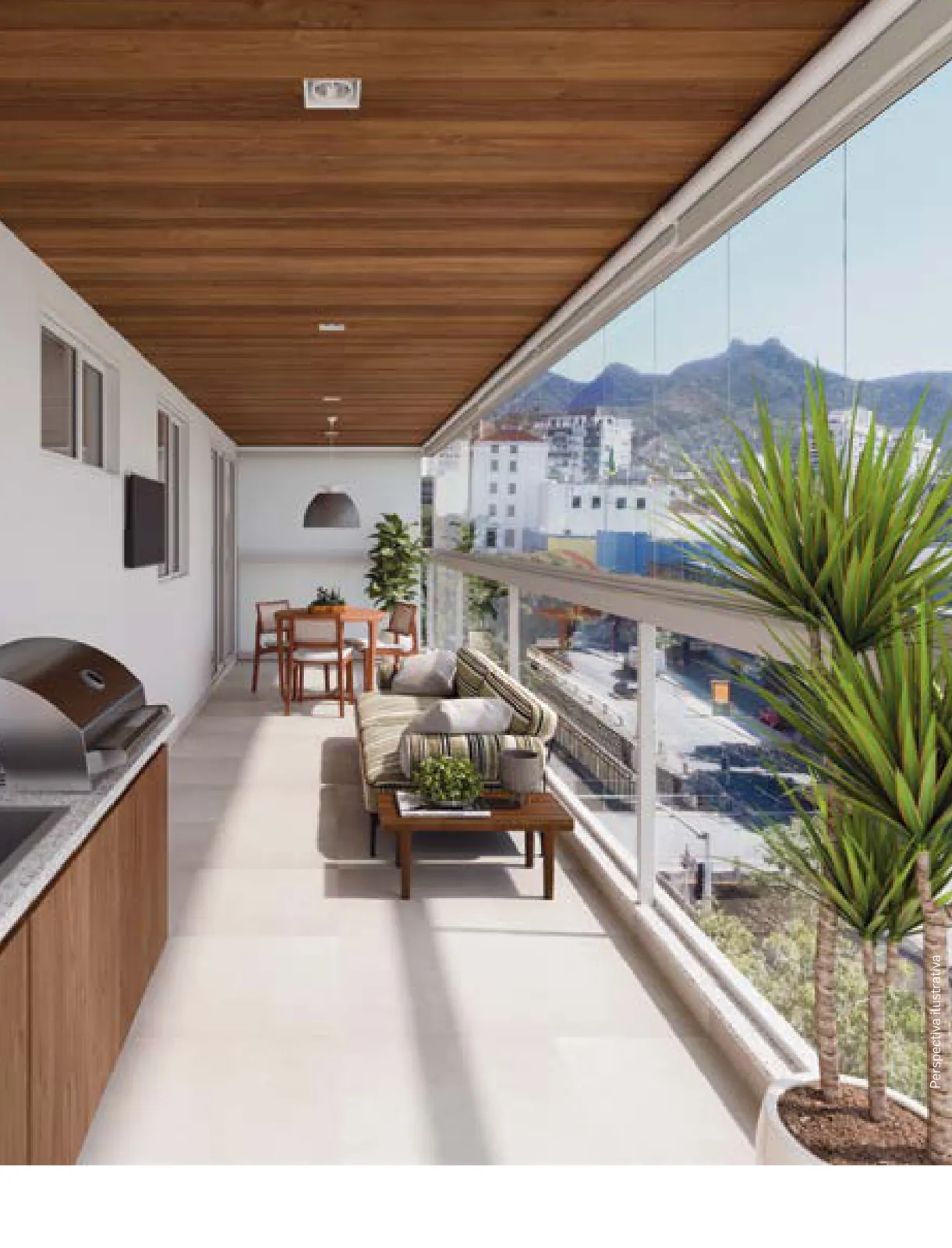 Varanda gourmet de um apartamento do Basílio Tijuca, com bancada e vista para as montanhas