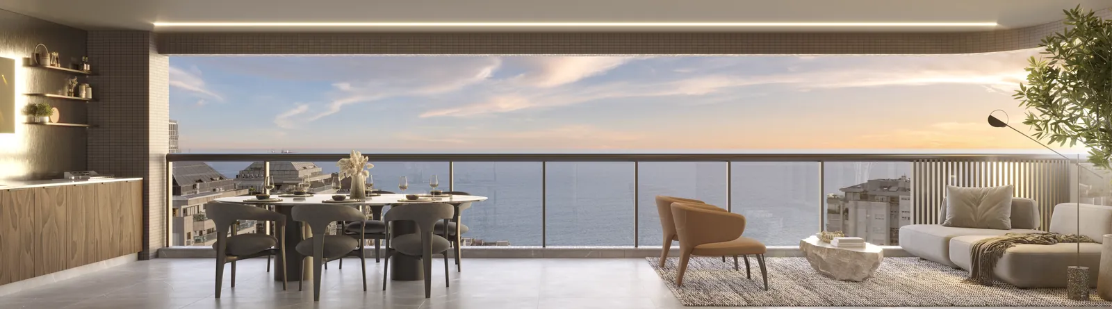 Varanda de um apartamento do Coupé com mesa e vista para o mar