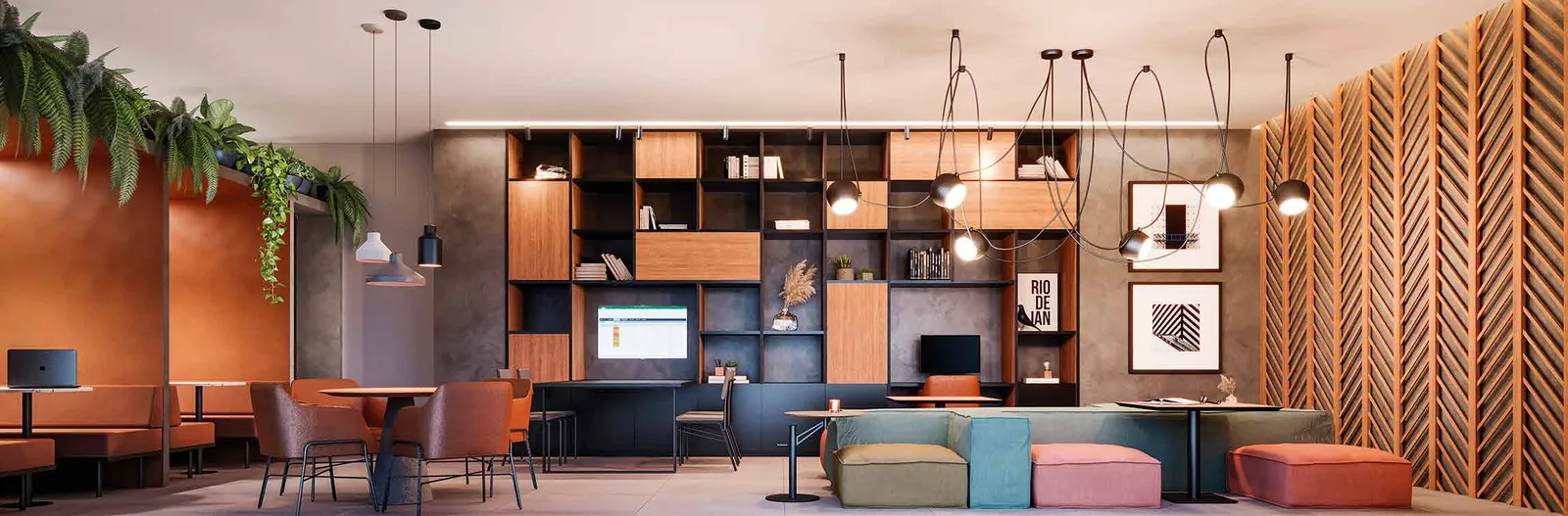 O coworking do Easy, com mesas e estante colorida