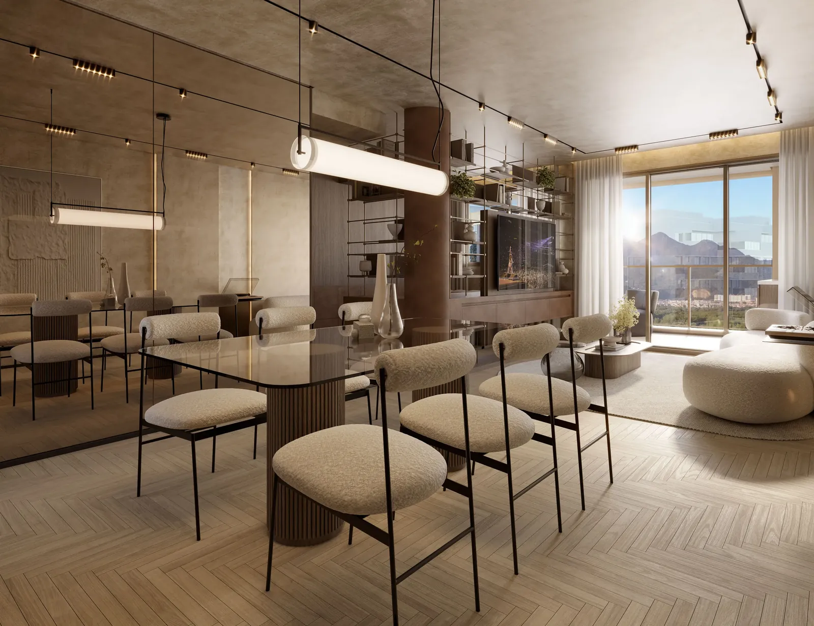 Sala de um apartamento do edifício Reserva, com sofá e cozinha aberta