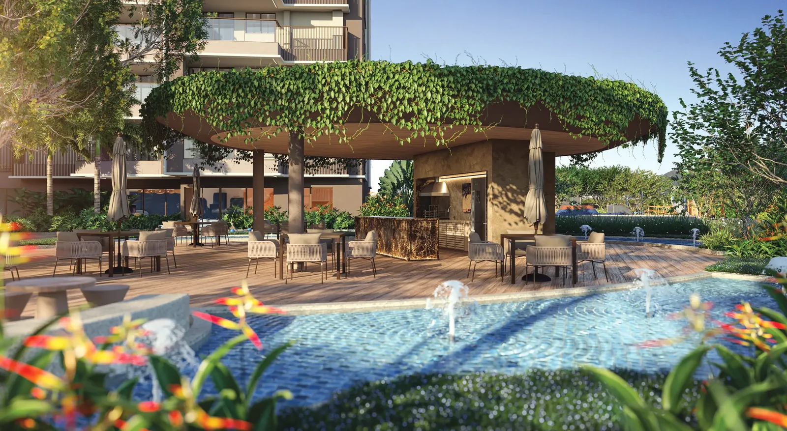 Churrasqueira gourmet com mesas, junto à piscina