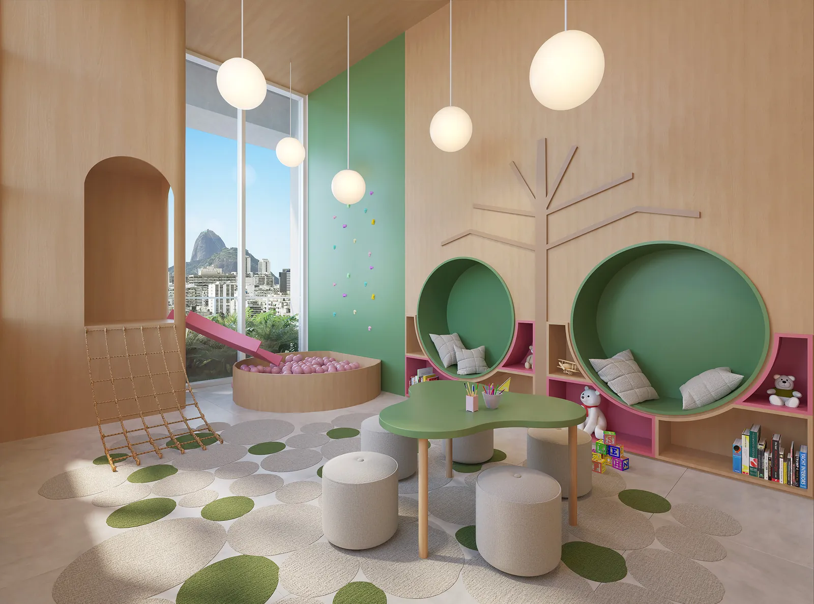 A brinquedoteca do First, com nichos verdes e vista do morro