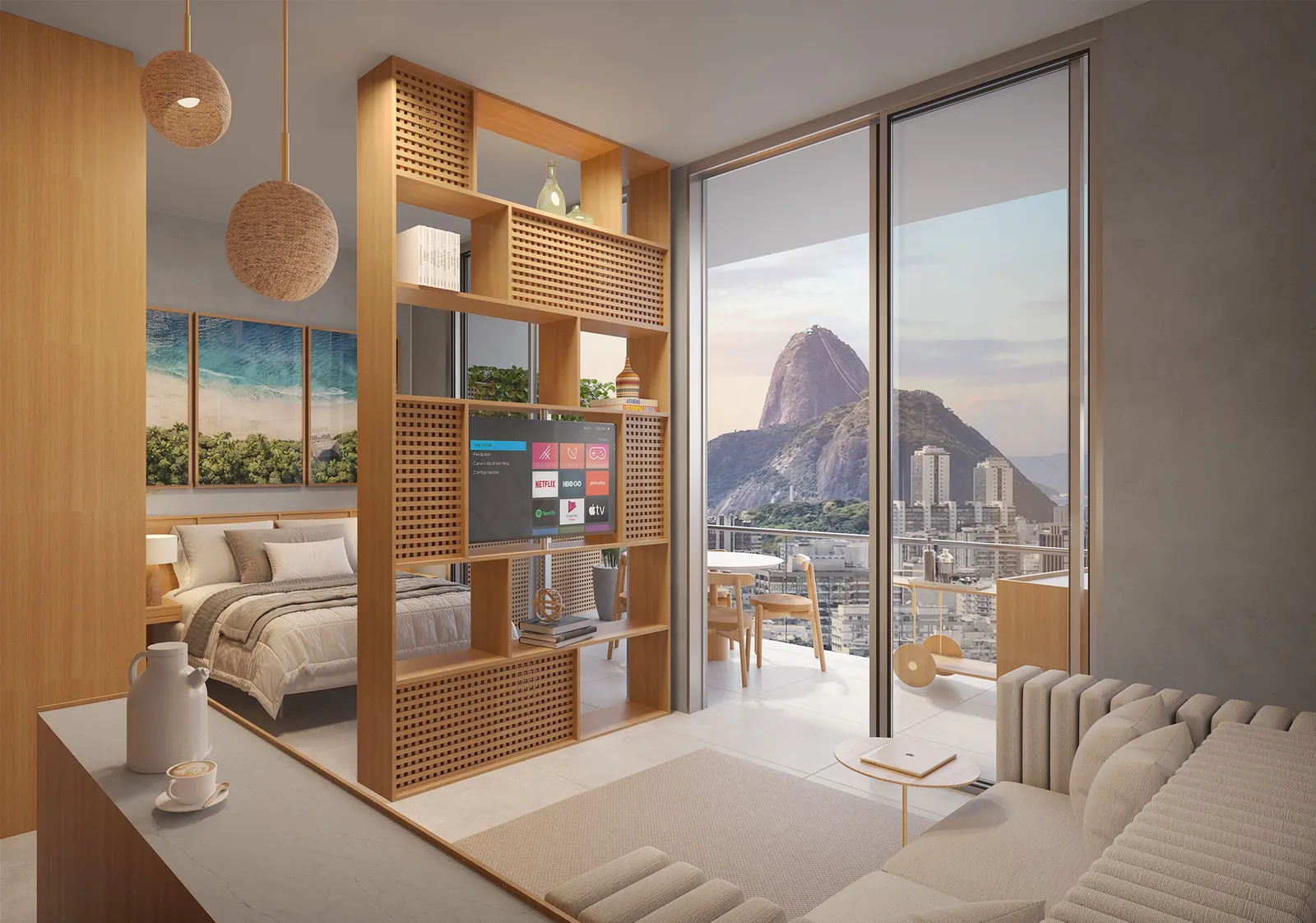 Um studio do First com cama, estante de madeira e vista para o Pão de Açúcar