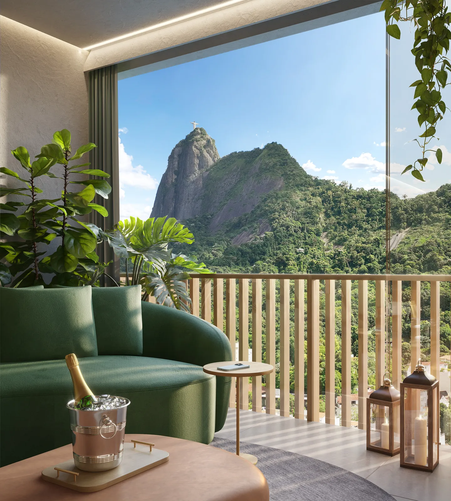A varanda de um apartamento do First com poltrona verde e o Corcovado à frente