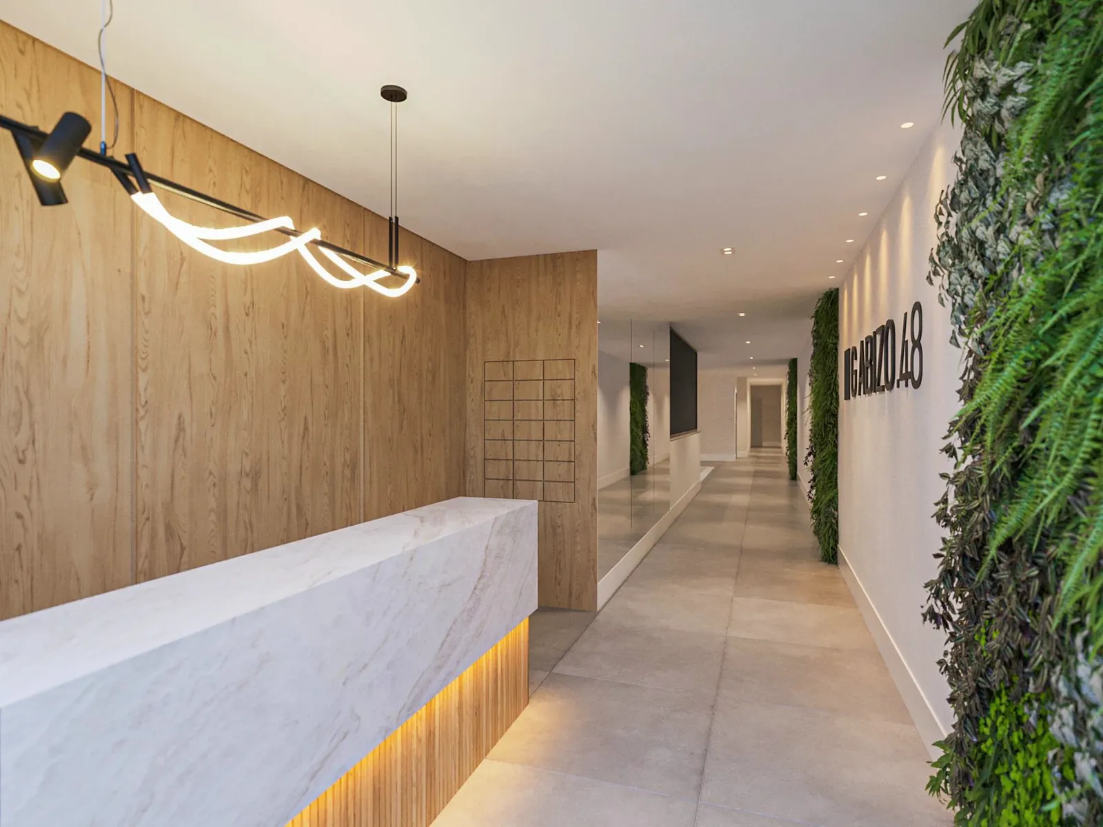Smart lobby com balcão de mármore, painel de madeira e jardim vertical
