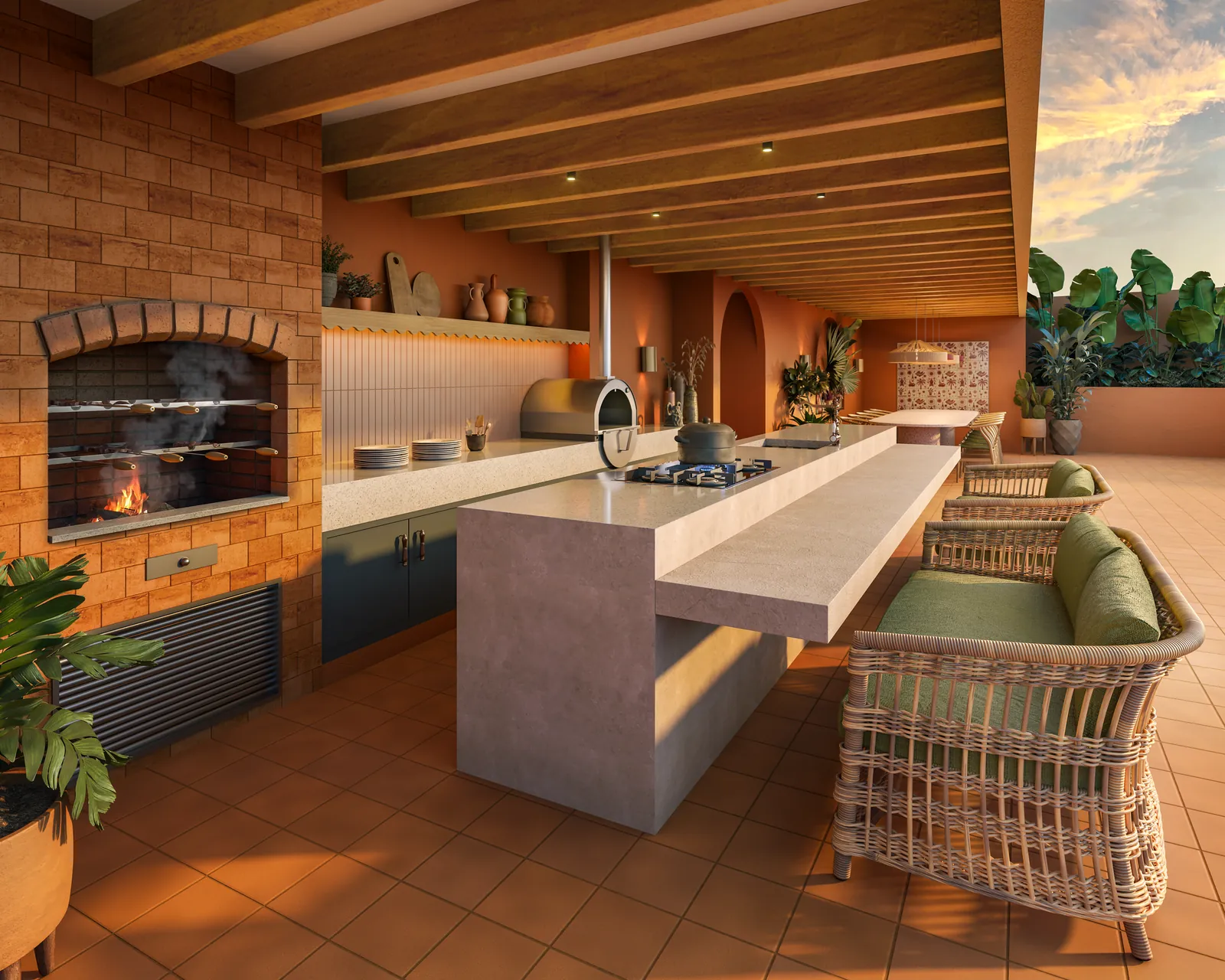 O espaço gourmet do rooftop com churrasqueira, forno de pizza e bancada