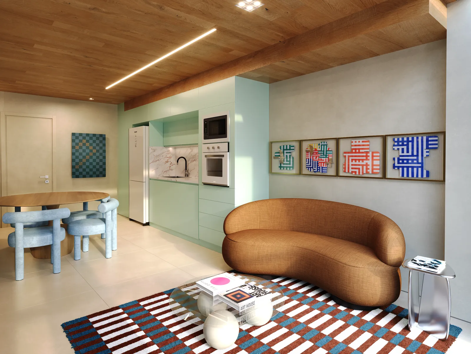 A sala de um apartamento de 2 quartos do Gaví, com sofá de couro e cozinha verde-água