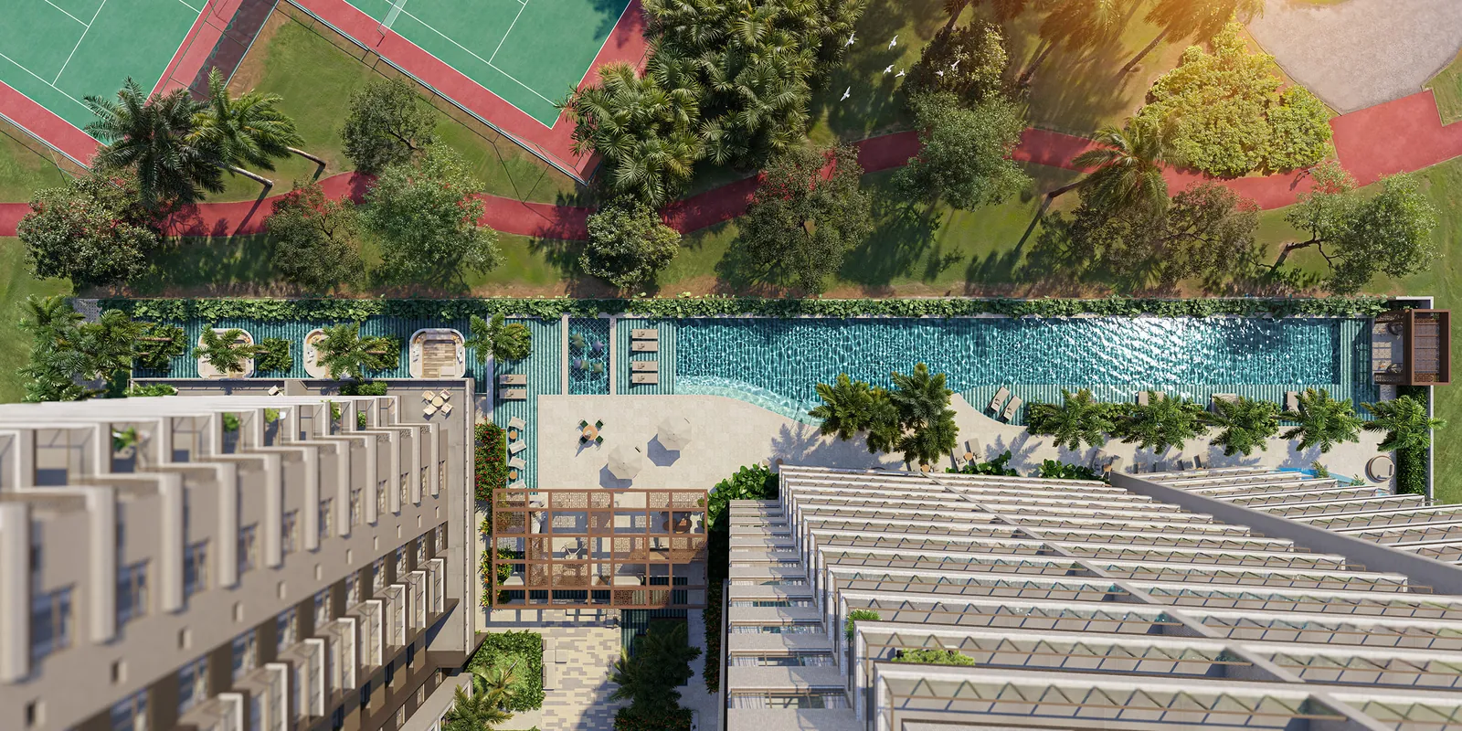Vista do alto da piscina com raia longa, deck e jardins