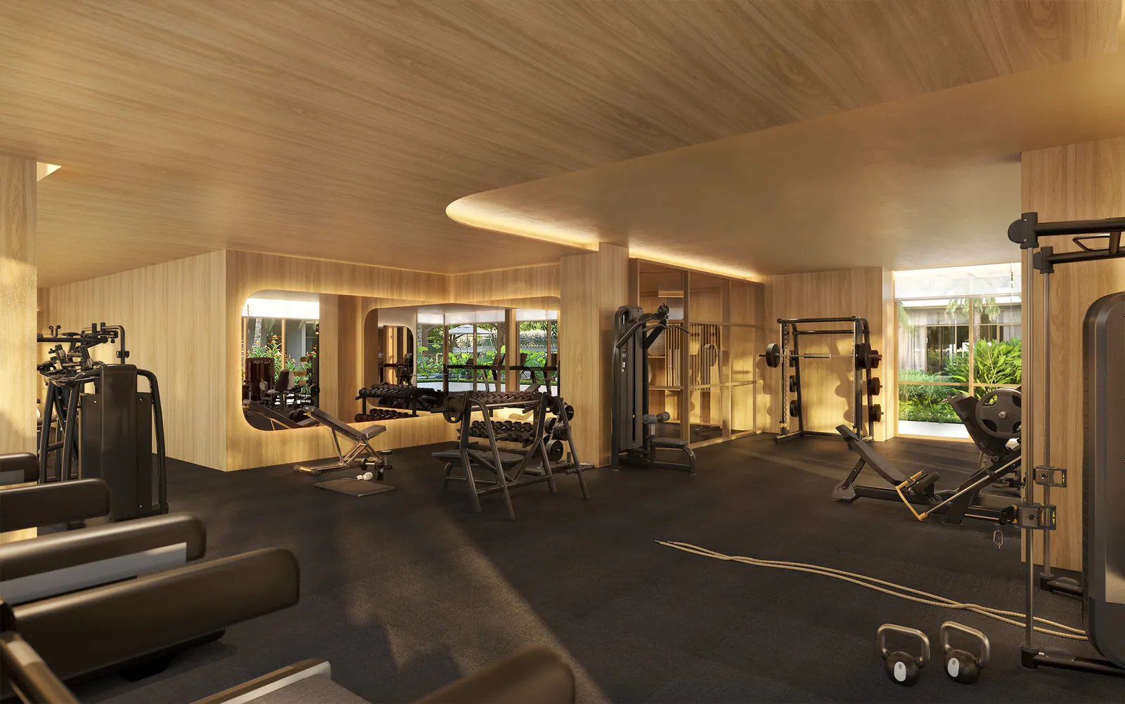 Academia com aparelhos de musculação e vista para o jardim