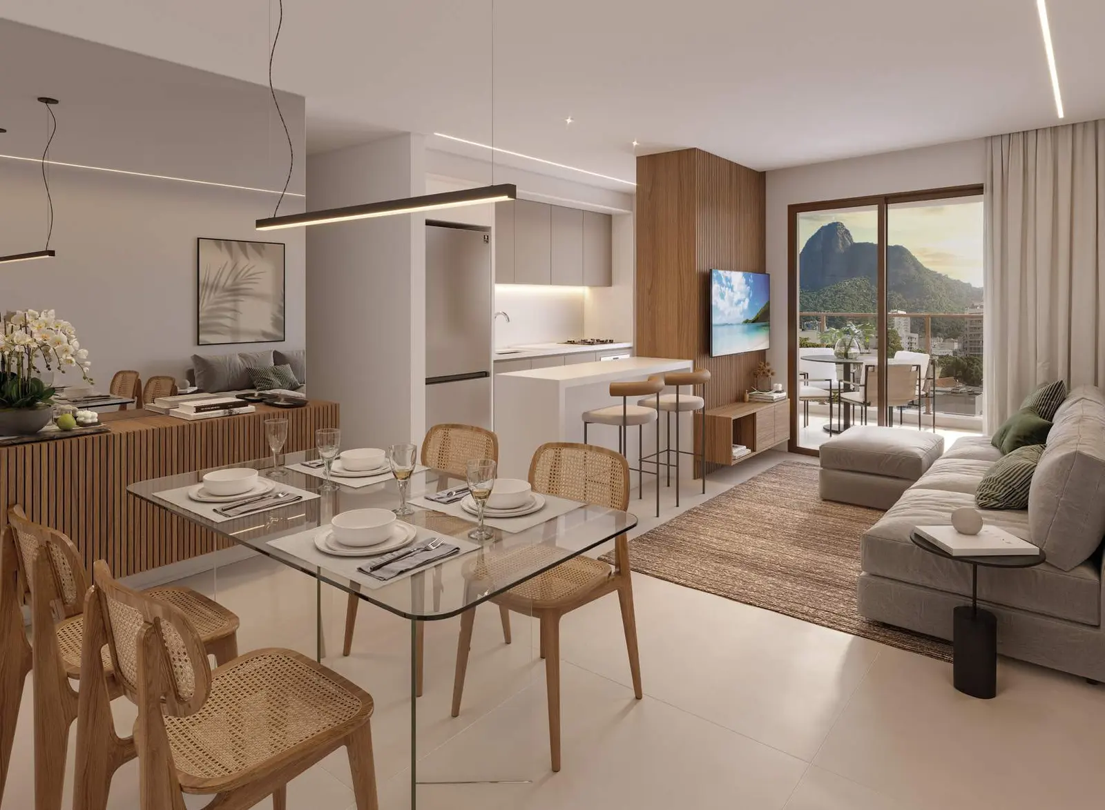 Living do apartamento de 2 quartos, com mesa de jantar e vista para o Cristo