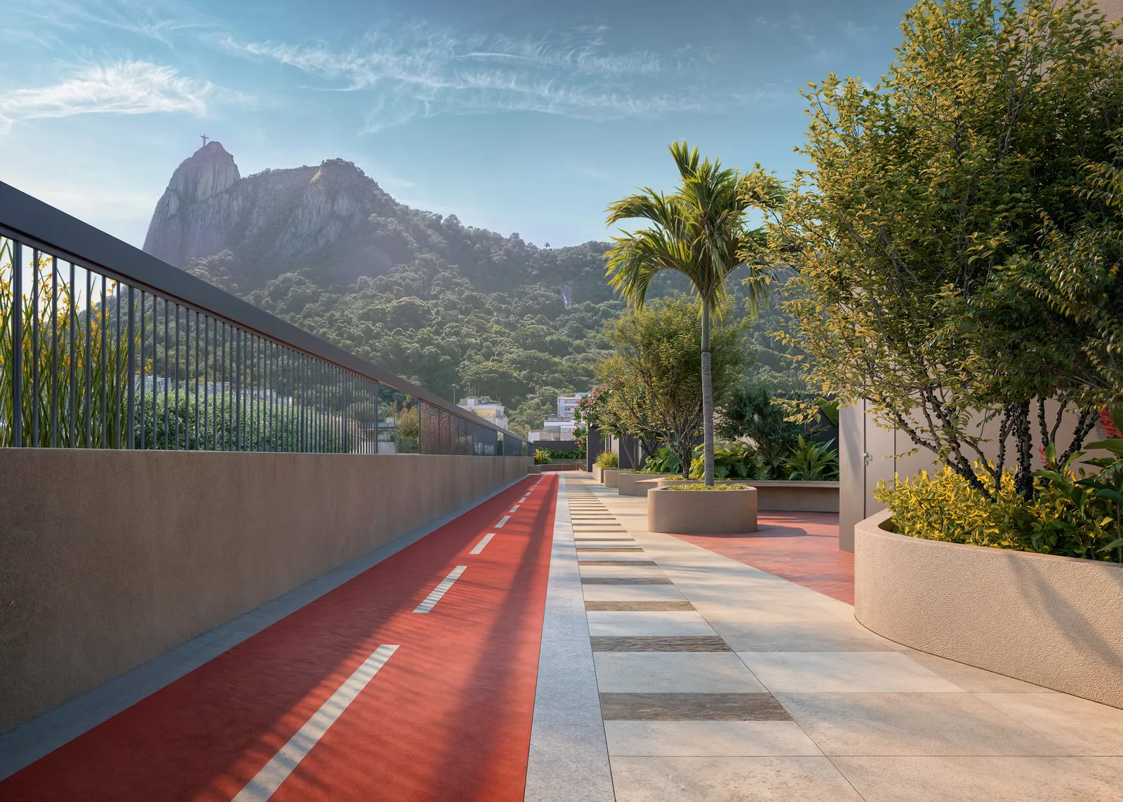 A pista de corrida vermelha do H.U.M entre jardins, com o Corcovado ao fundo