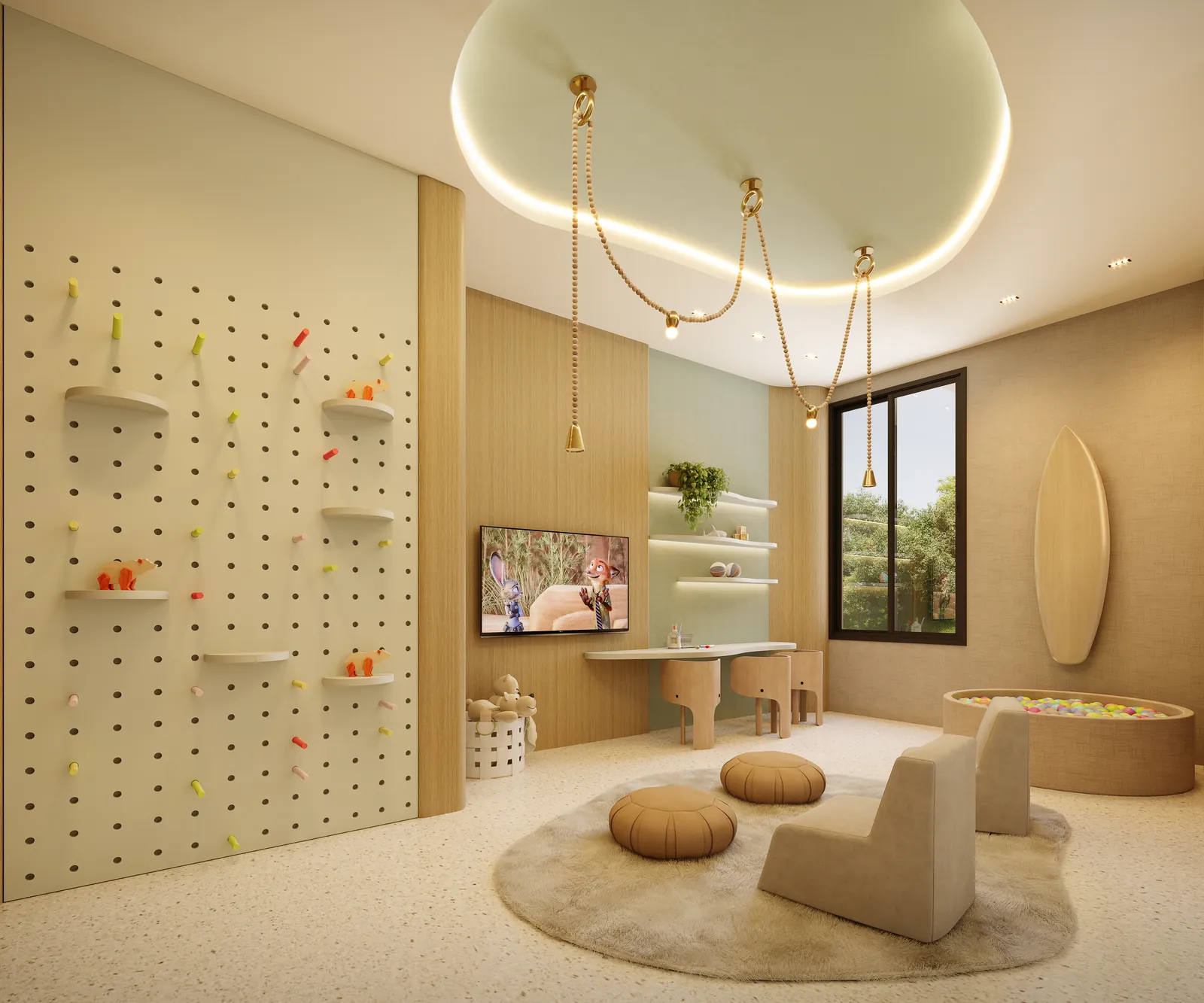 Espaço kids com parede de escalada e almofadas