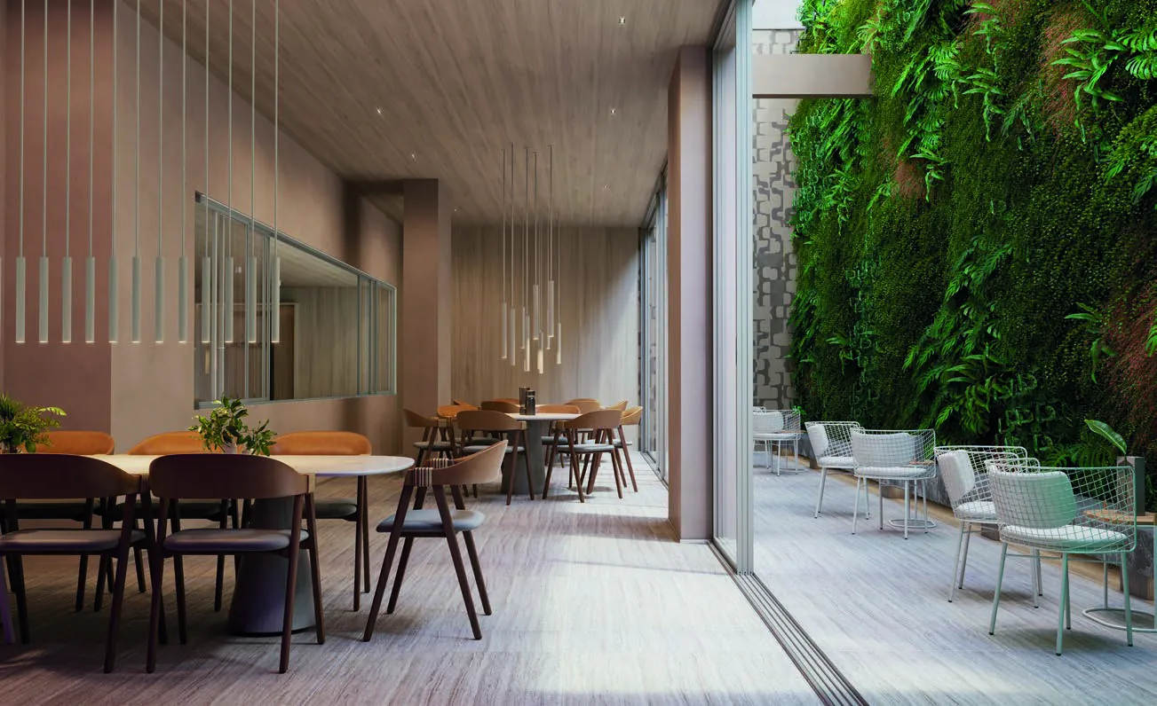 O lounge gourmet do Ipa, com mesas e jardim vertical