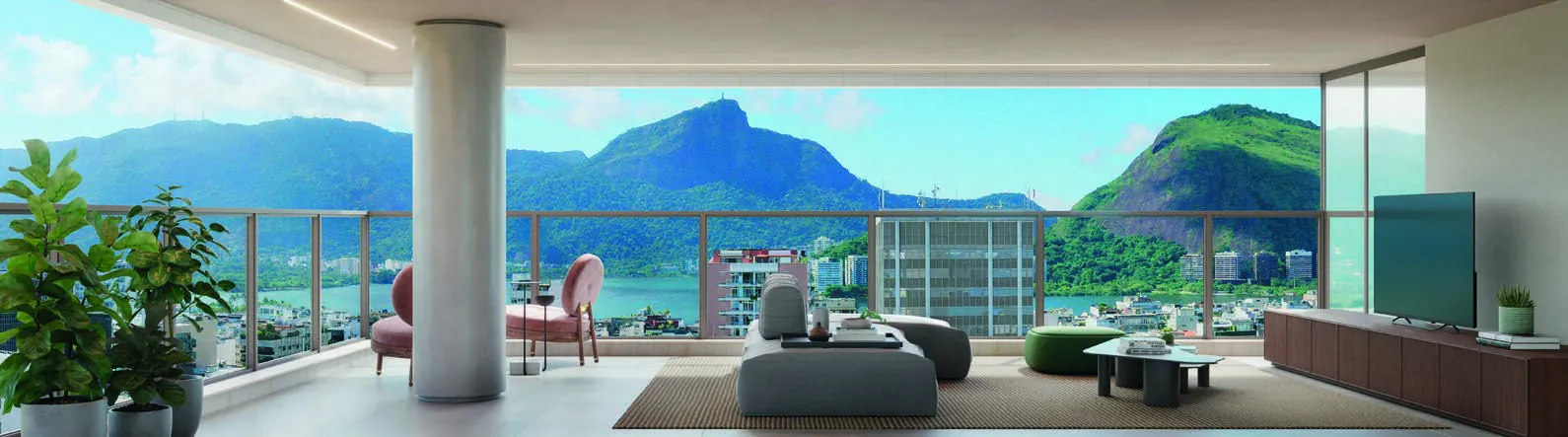 A sala de um studio do Ipa, com varanda e vista para o Dois Irmãos