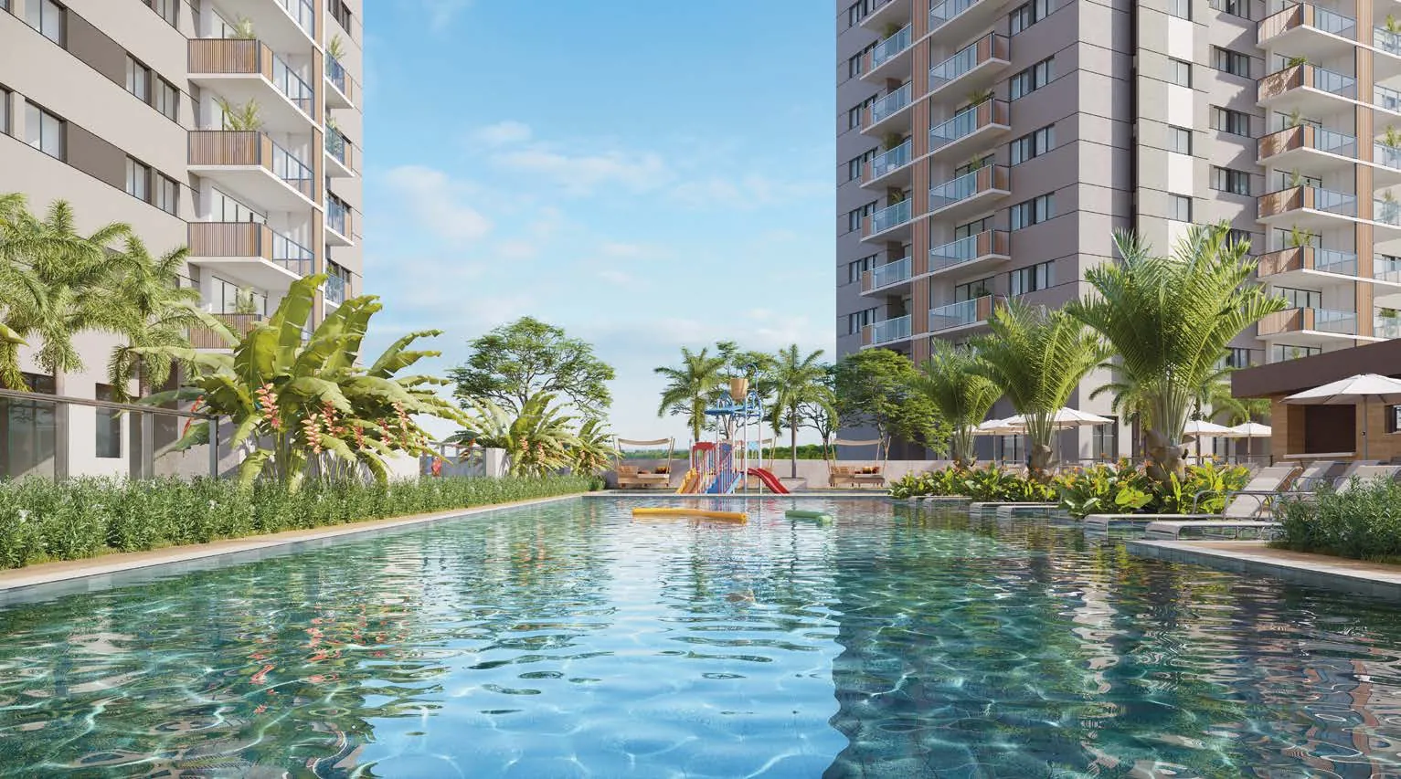A piscina com raia do Jardim da Barra, com palmeiras