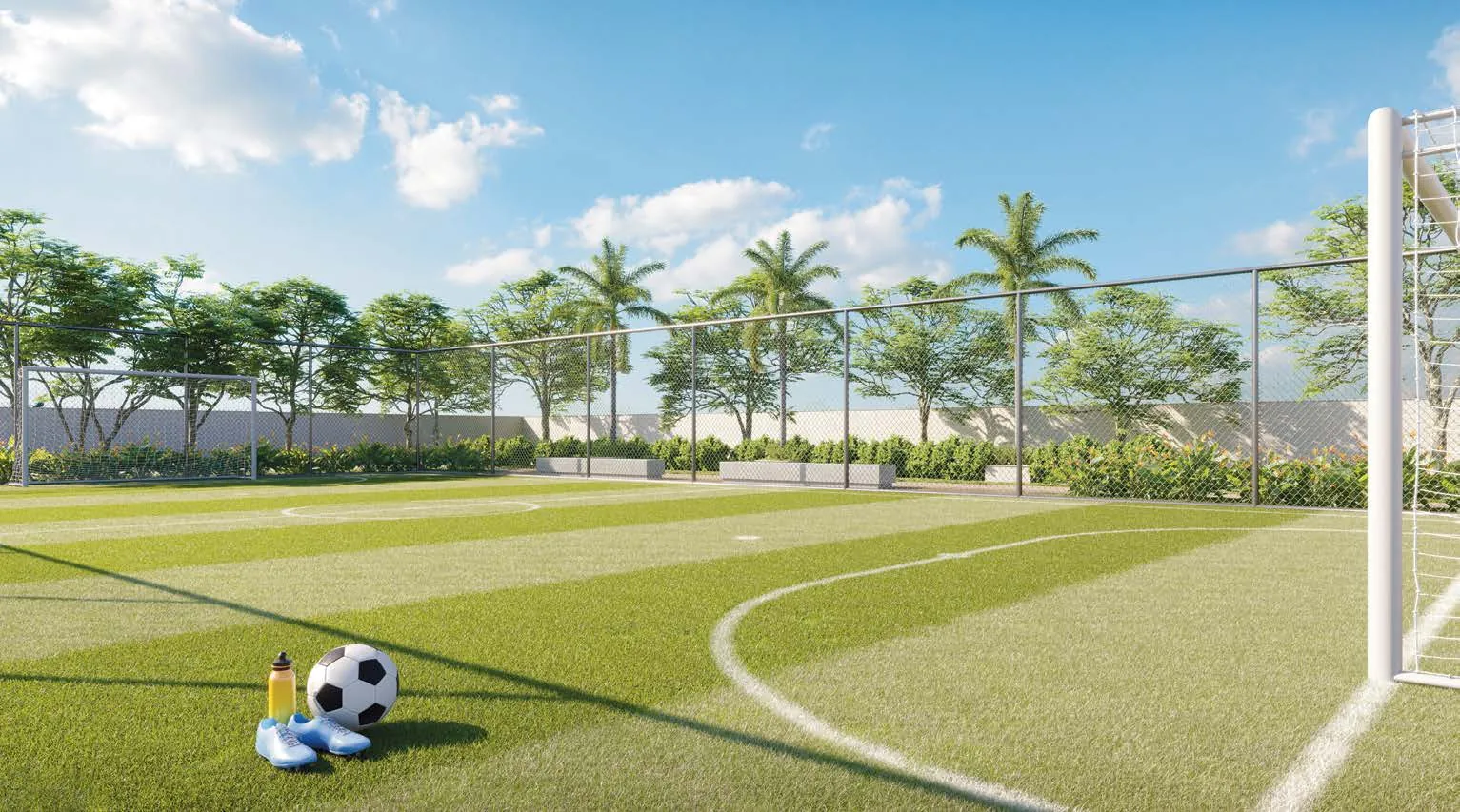 O campo gramado do Jardim da Barra, com traves