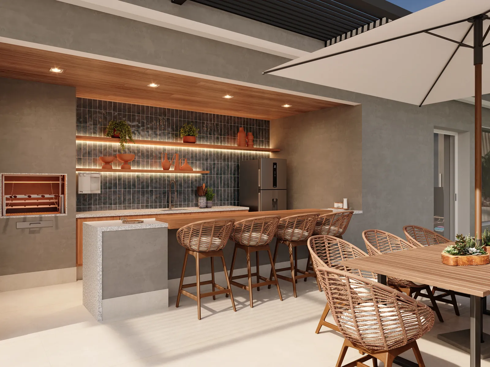 Espaço gourmet com bancada, banquetas e mesa de madeira