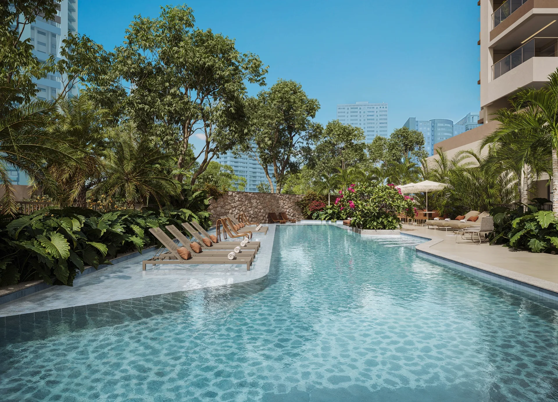 Piscina principal do Kronos, em estilo resort, com espreguiçadeiras