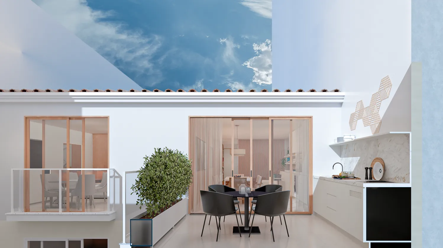 Terraço descoberto da cobertura com mesa e o céu de Ipanema