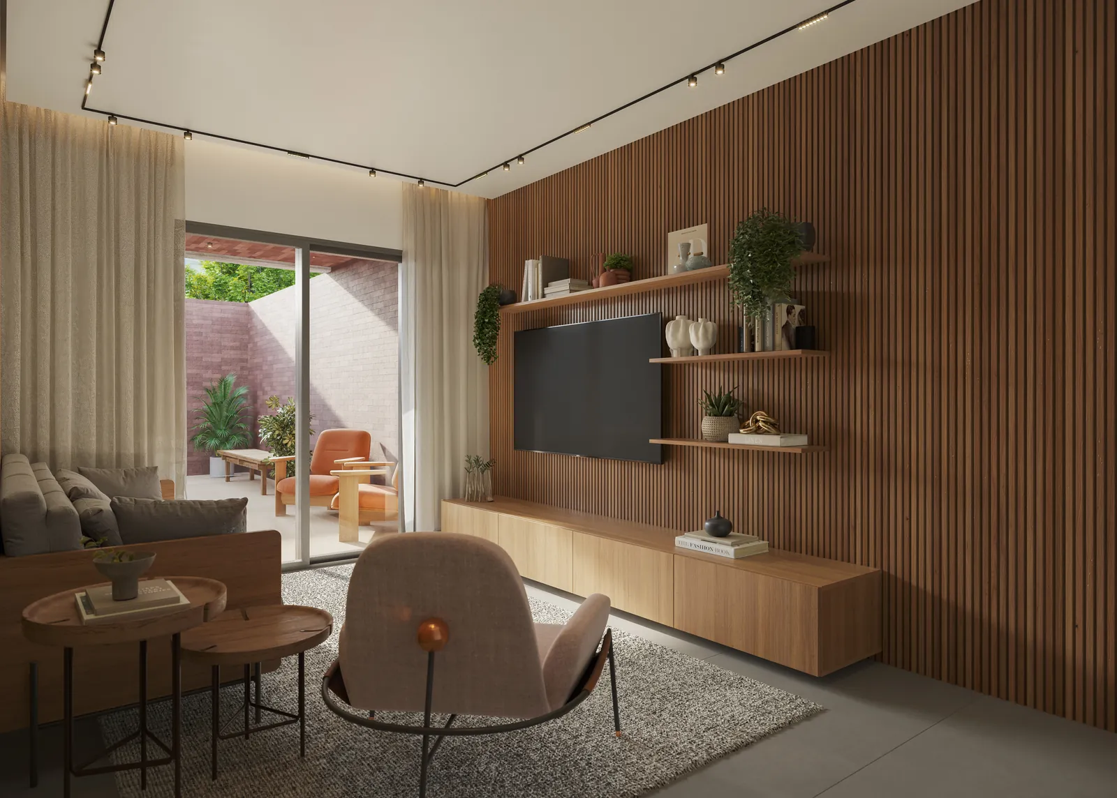 Sala com sofá, mesa de jantar e cozinha integrada