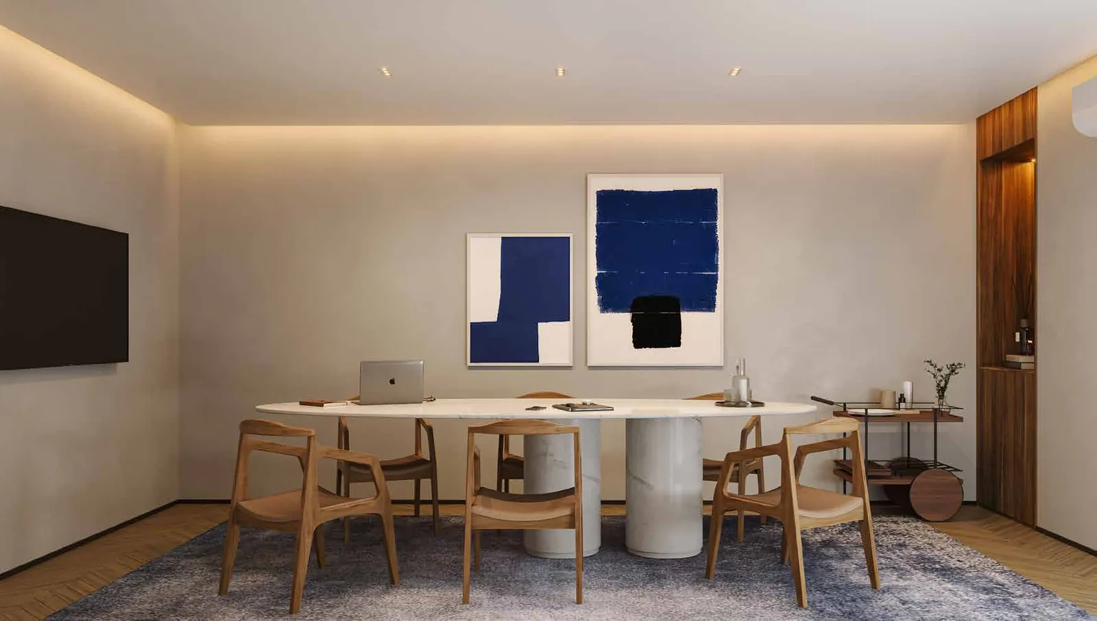A sala de reunião do Oba Urca, com mesa e quadro azul