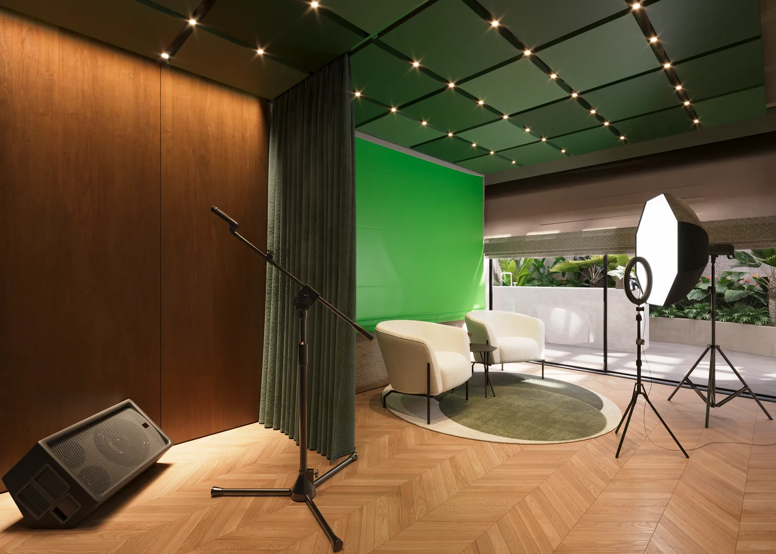 O espaço creator do Oriá, com fundo verde e luzes de estúdio