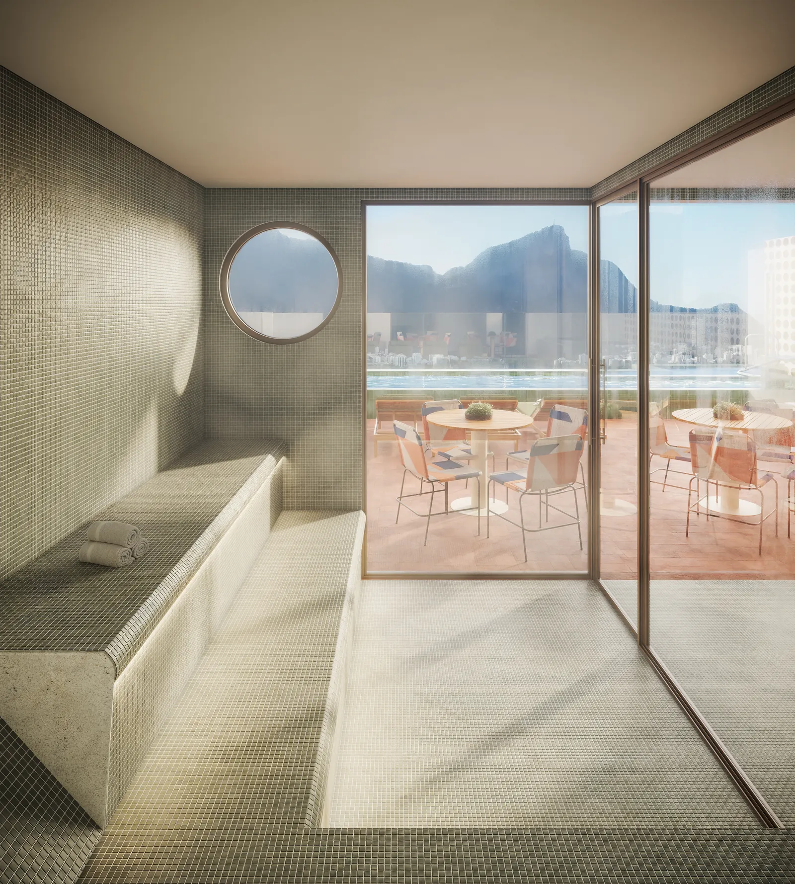 Sauna com janela redonda e vista para o Morro Dois Irmãos
