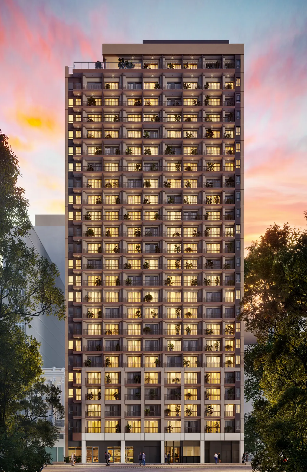 A torre do Q Studios ao entardecer, com as janelas acesas