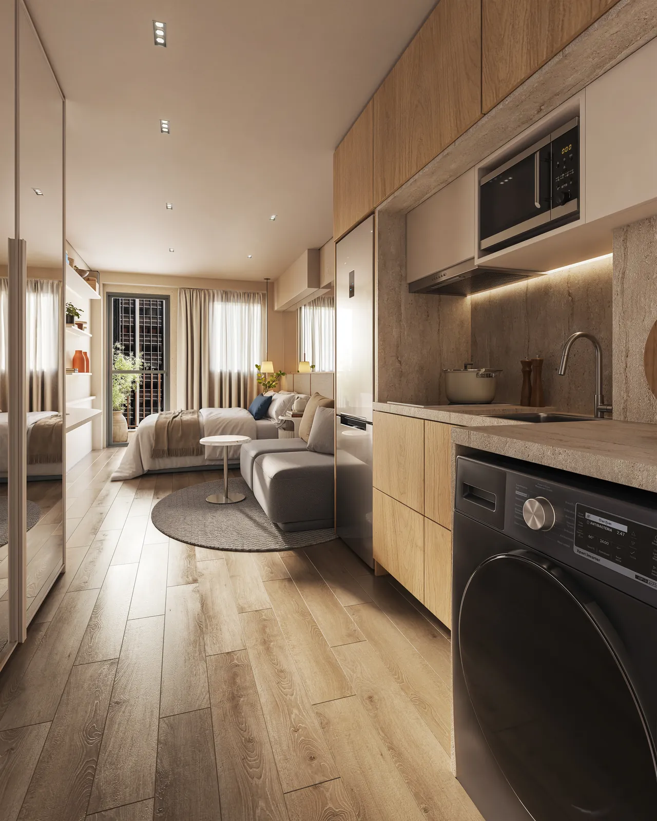 Cozinha linear com máquina de lavar, sala e varanda ao fundo