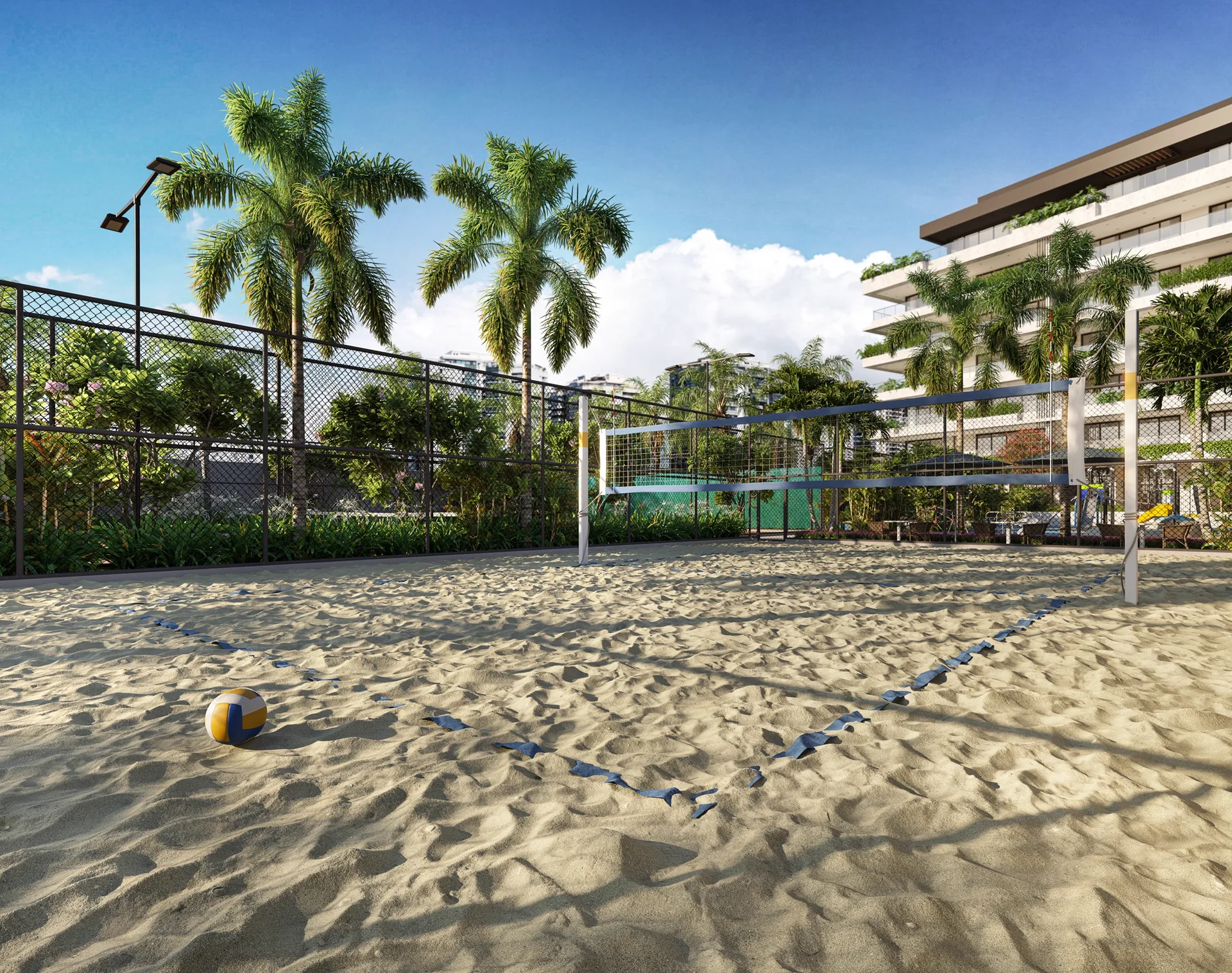 Quadra de areia com rede de vôlei e palmeiras ao redor