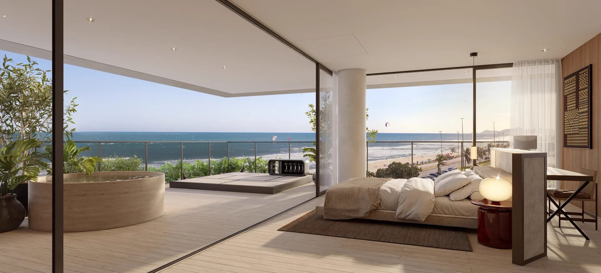 Suíte master do decorado, com a praia da Barra pela janela