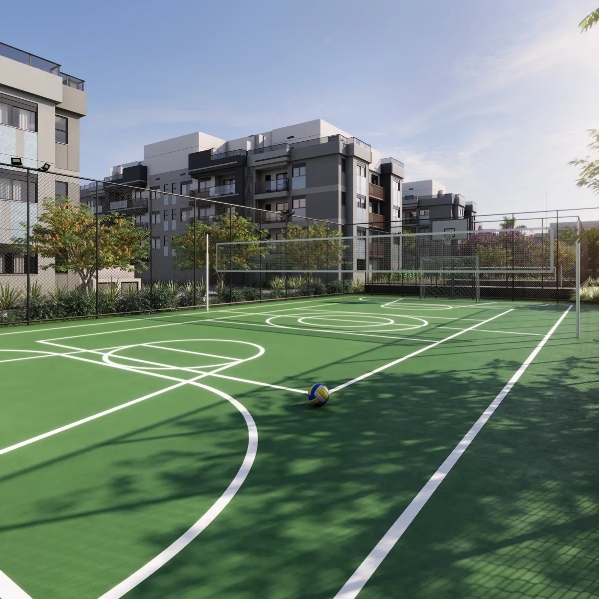 Quadra recreativa gramada com as torres ao fundo