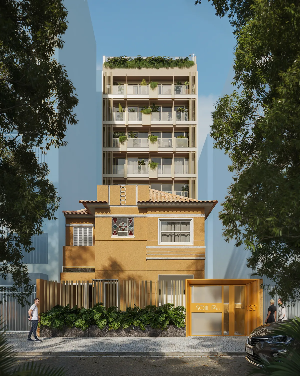A casa amarela preservada na frente e o prédio do Soul Rio atrás, na Rua Alberto de Campos
