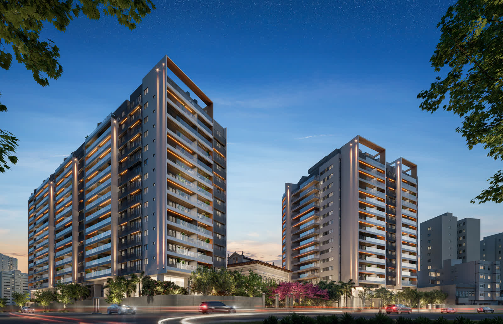 Fachada das duas torres residenciais do Symphony vistas da rua, ao entardecer