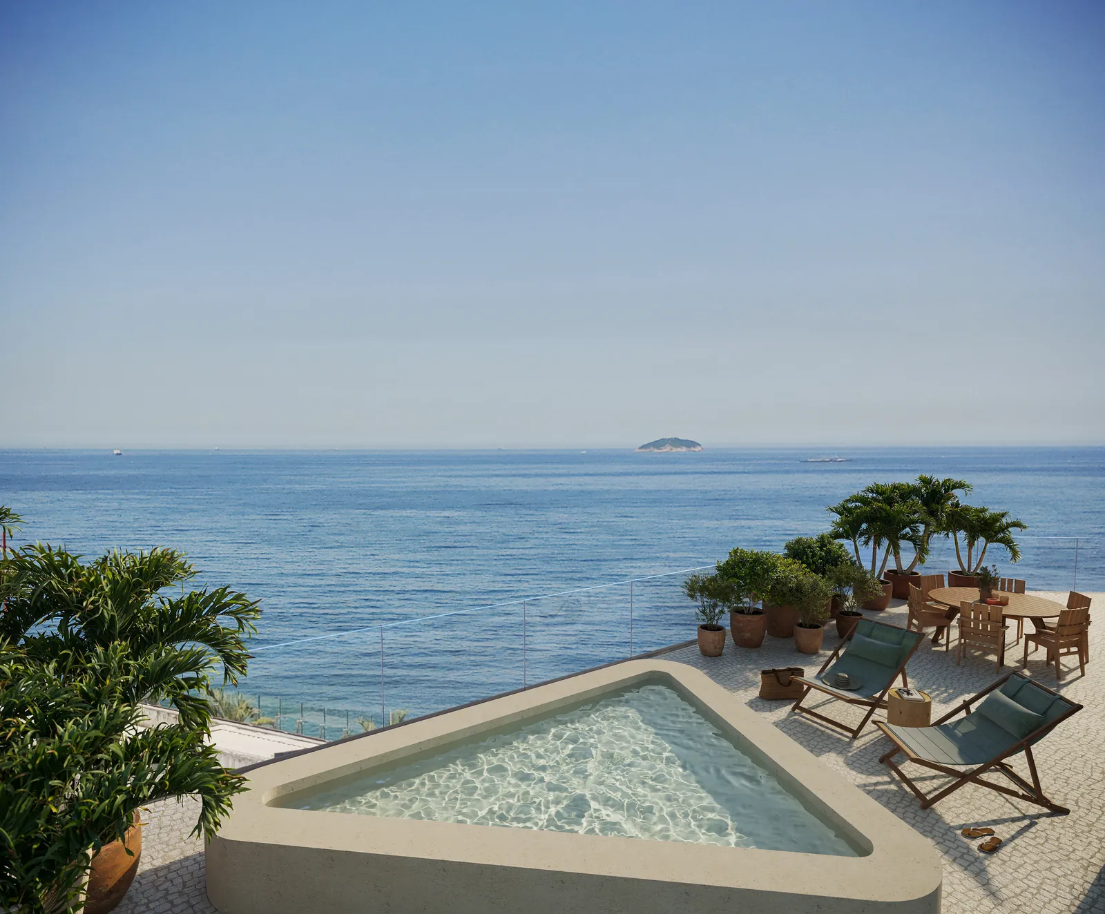 A piscina do terraço da cobertura 1101, com o mar de Ipanema e as Cagarras ao fundo