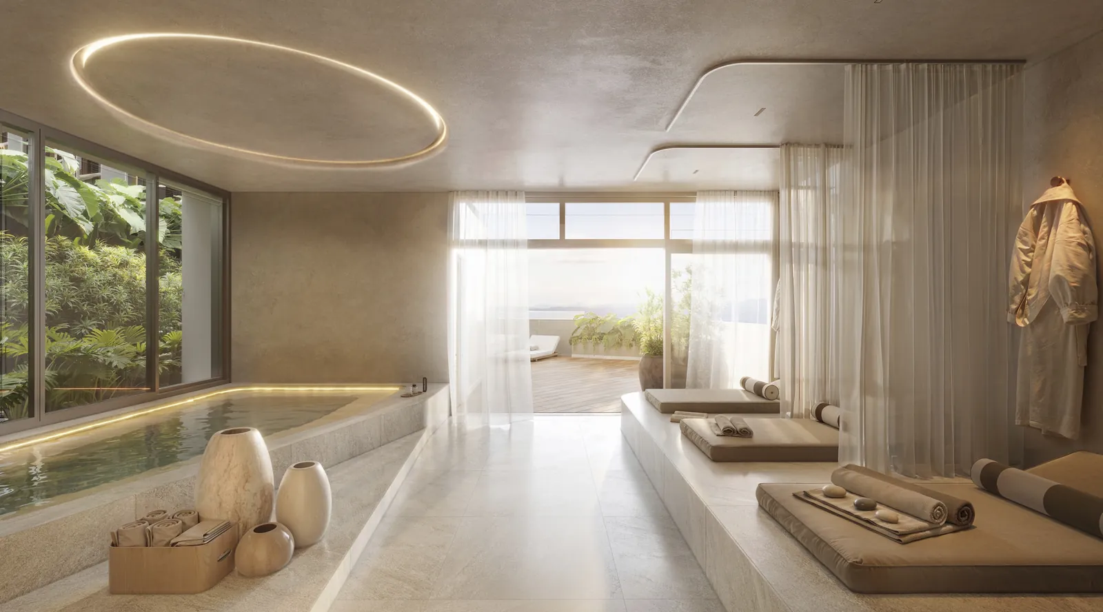O spa interno do We Barra, com piscina coberta e espreguiçadeiras
